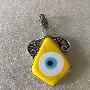 Yellow glass Evil Eye Pendant